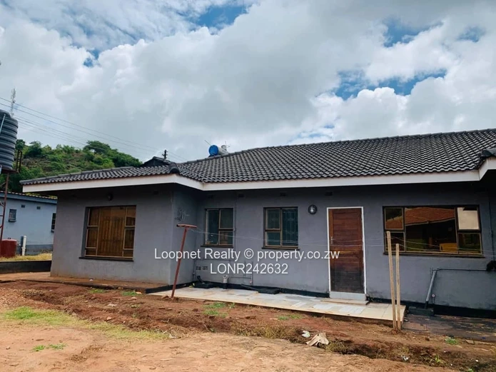 Brick-accented 3-Bed Concession Home with Borehole