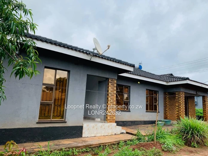 Brick-accented 3-Bed Concession Home with Borehole